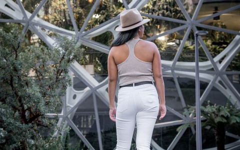 Woman standing admiring art installation 