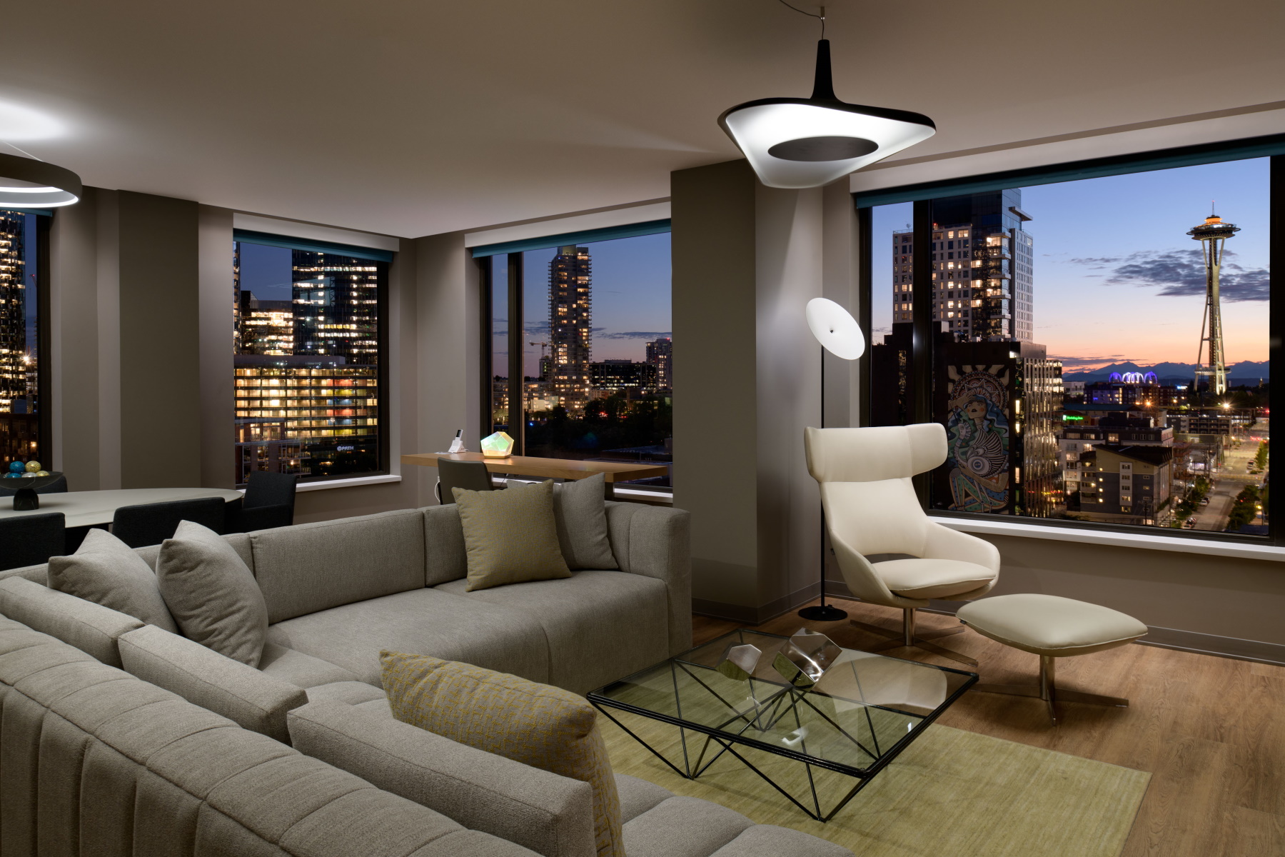 tp_seatn_small_pres_living_room_night_city_view