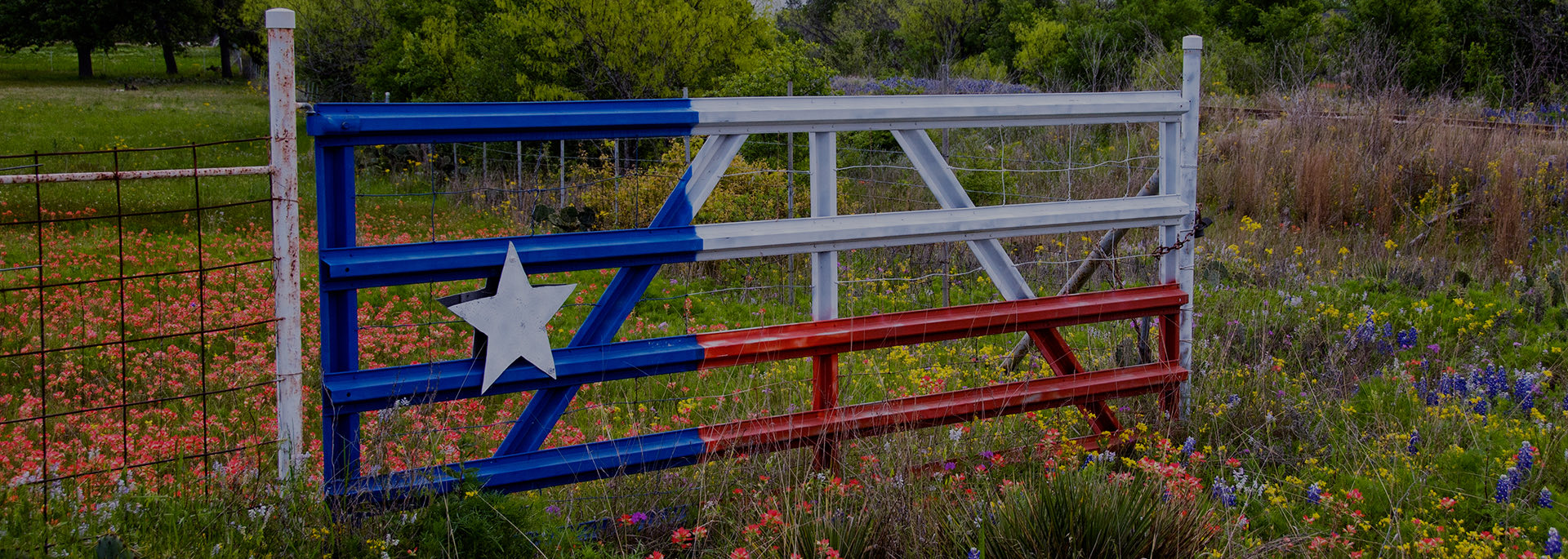 view of a fence painted in american flag colors