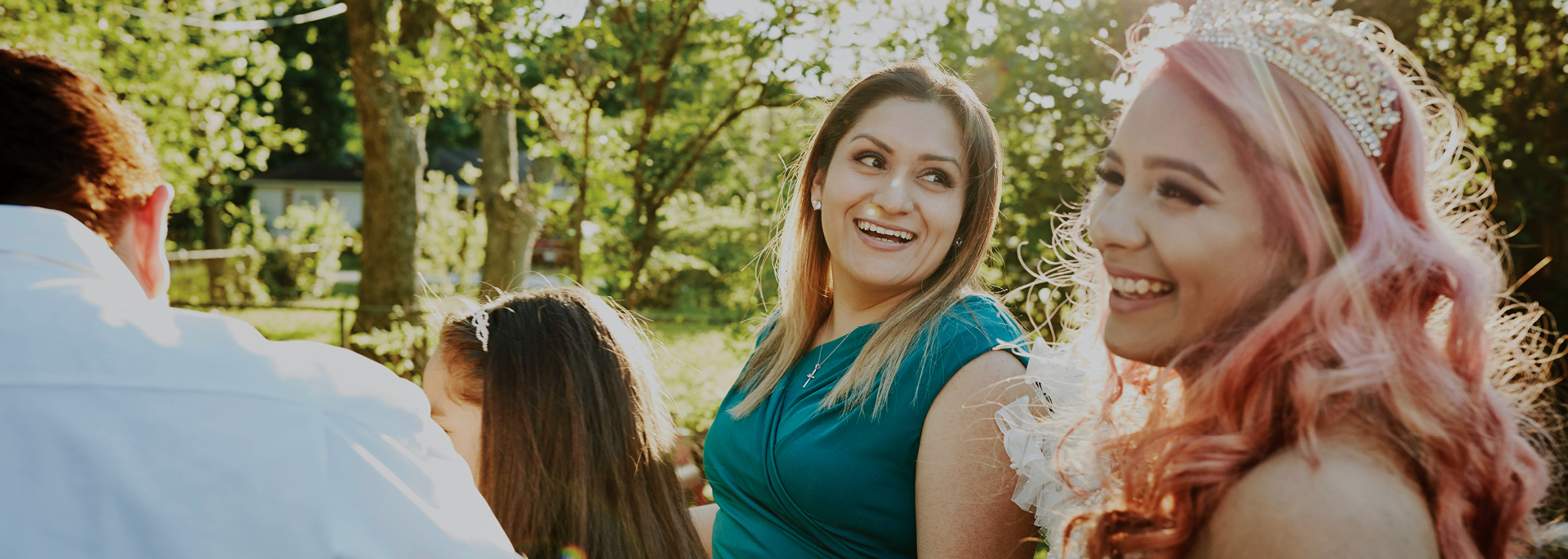 two women smiling at camera
