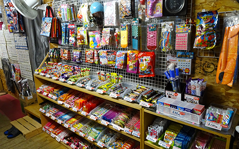 Inside of a local snack shop with candy and chocolates on display