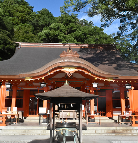 front view of traditional japanese orange building with black roof