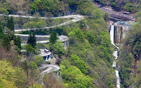 Aerial view of Irohazaka road and a waterfall flowing nearby