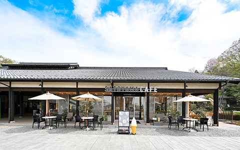 Exterior of Satoyama Cafe with outdoor tables and chairs