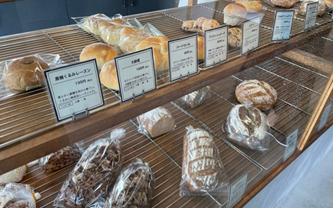 Freshly baked bread on display inside the bakery