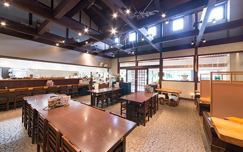 Interior of Japanese restaurant Aguri with tables and counter seats