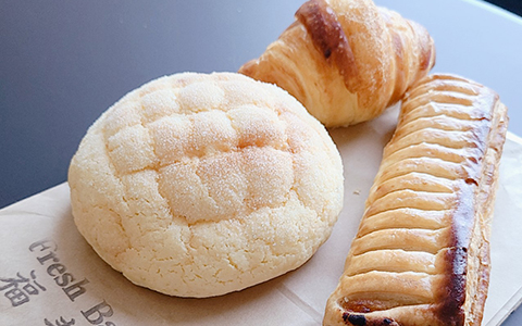 Freshly baked melon shaped bread and pastries