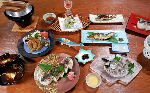 Dishes of Ayu sweetfish cooked and served as sashimi, grilled, fried.