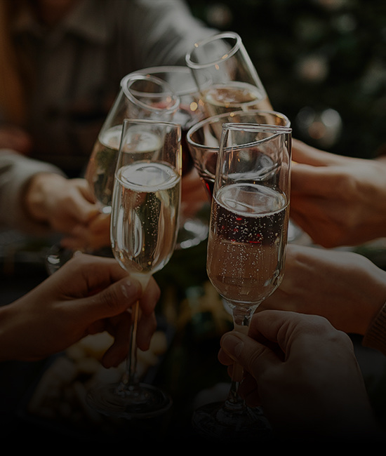 Group of people holding champagne glasses
