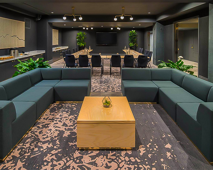 sofas arranged in U shape with a table in the middle
