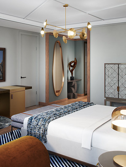 large bright hotel room with a flat screen