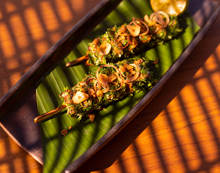 grilled corn prepared with delicious toppings