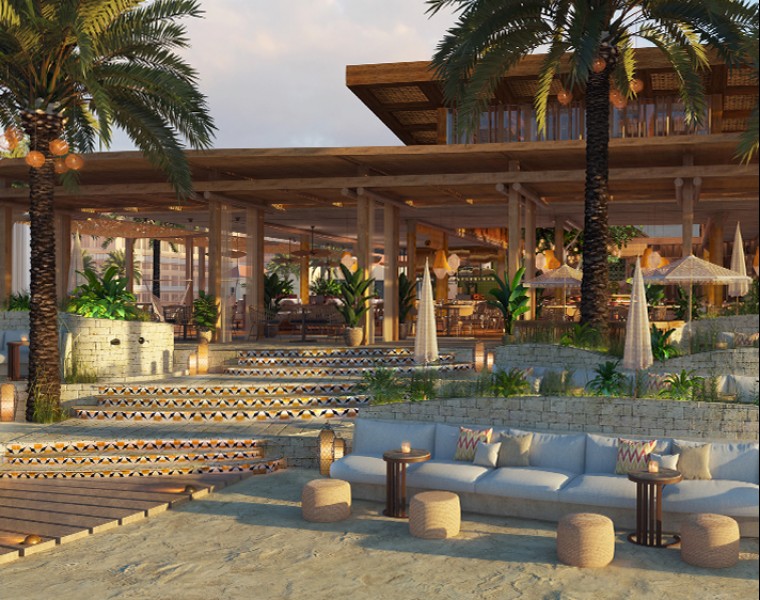 view of the restaurant on the sand and surrounded by palm trees