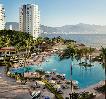 aerial view of large pool near the mountains