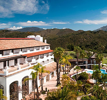 spanish style hotel building in the mountains